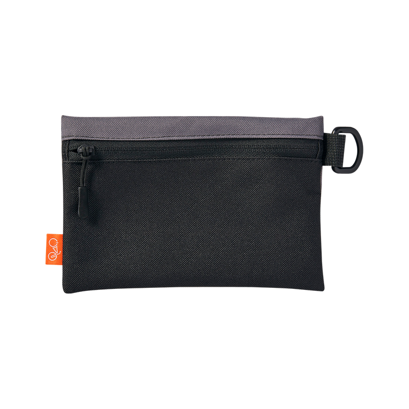 Close up of black, removable zippered pouch from the Fremont Pannier Bag.