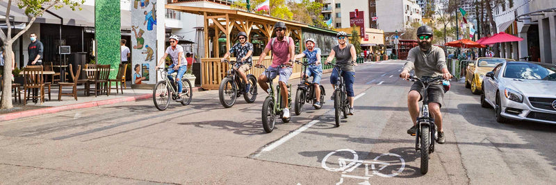 A group of riders on Rad Power Bikes ebikes in San Diego.