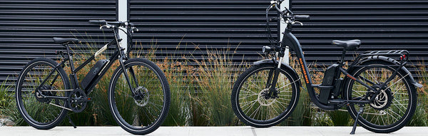 A RadMission electric metro bike and a RadCity electric commuter bike pictured alongside each other. 