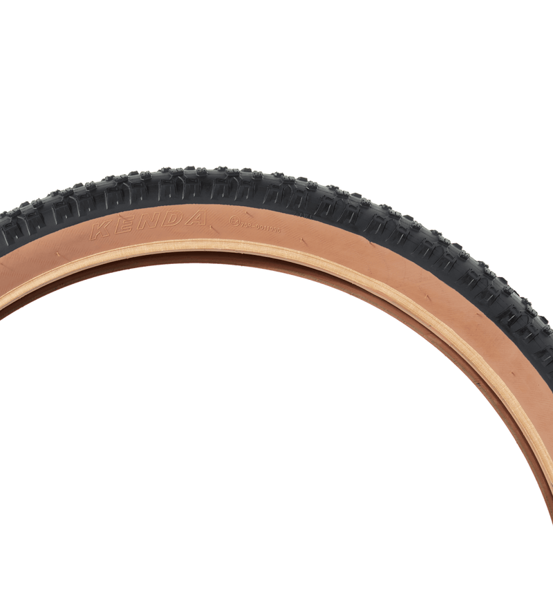 Ebike tire with tan sidewall, branded with "Kenda" in the sidewall