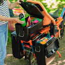 Woman and child on a RadWagon electric cargo bike with hardshell locking storage accessories mounted to the back.