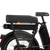 The right side of a black electric bike with a range extender and battery installed under the rear passenger seat. 