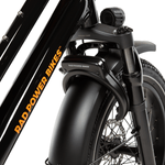 A Rad Fat Tire Wheel Lock mounted to a RadWagon 5 electric cargo bike, using the lock mount that needs to be purchased separately, but is not very visible once the lock is installed.