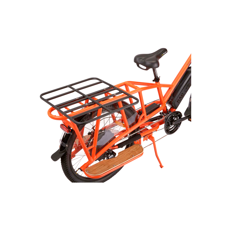 up close image of a black rack platform mounted on the back of an orange wagon bike 