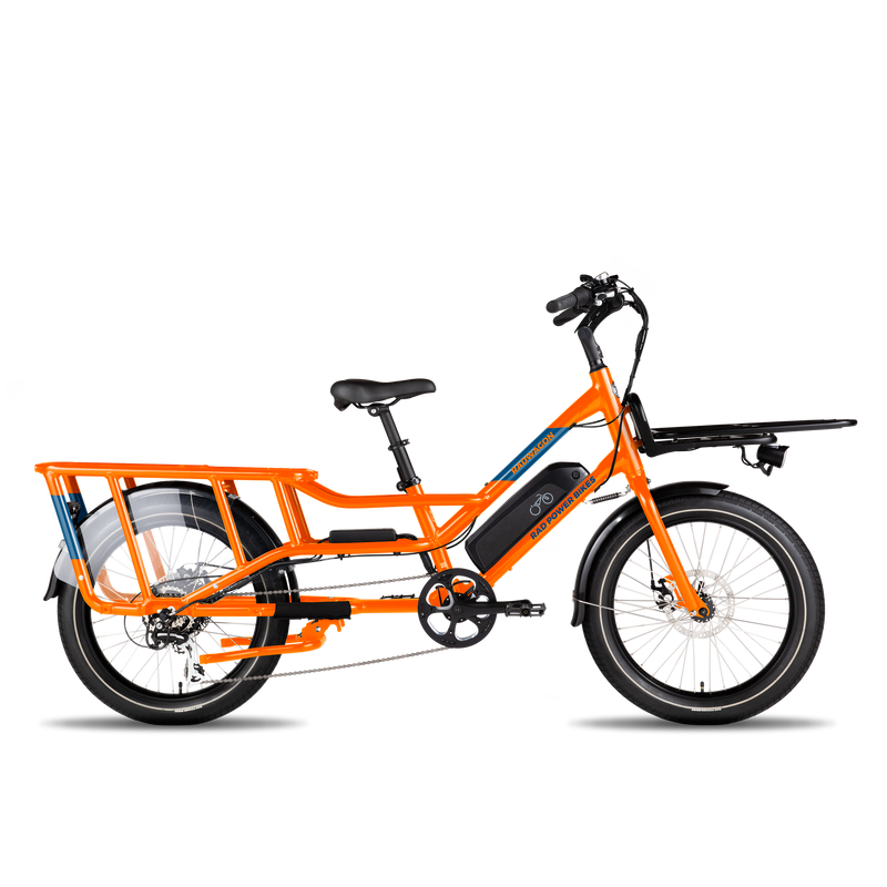 side view of a mounted black rack platform on the front of an orange bike