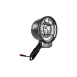 A black headlight with lower reflector and protective cage on the front