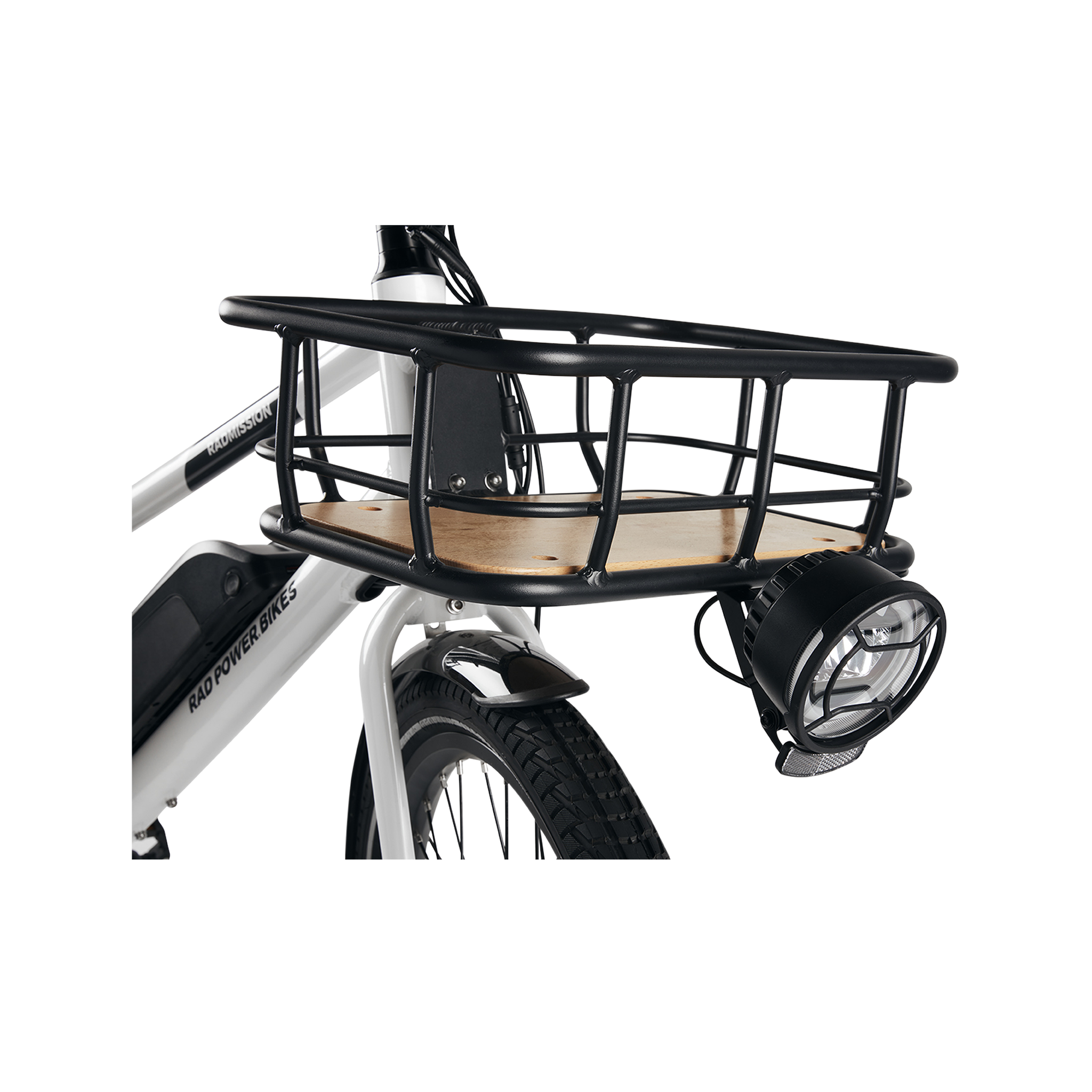 A headlight mounted to a front basket on the front of a grey Ebike