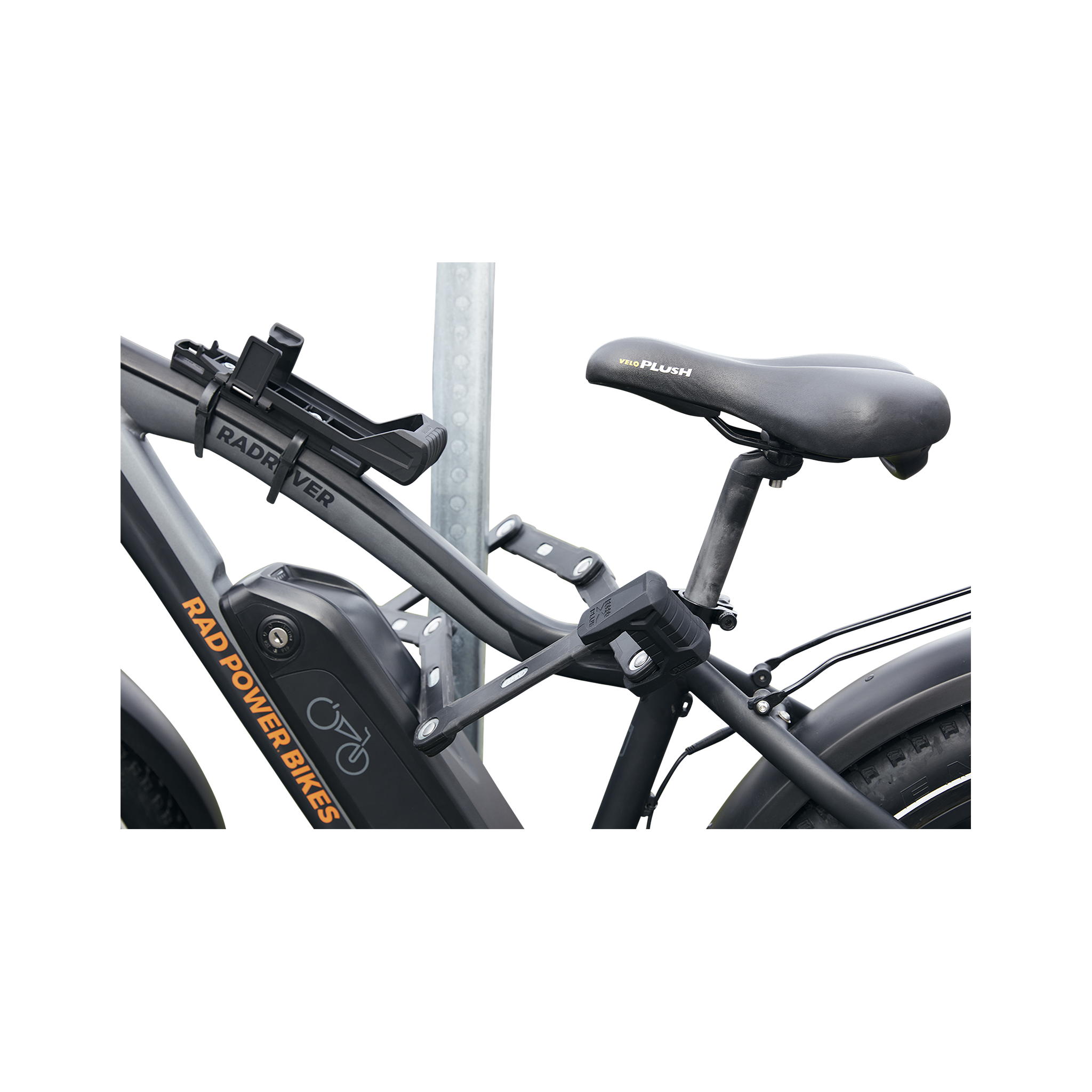 Close up side view of ABUS Bordo Granit X-Plus 6500 Folding Lock safely locking an ebike through the frame to a bike rack.