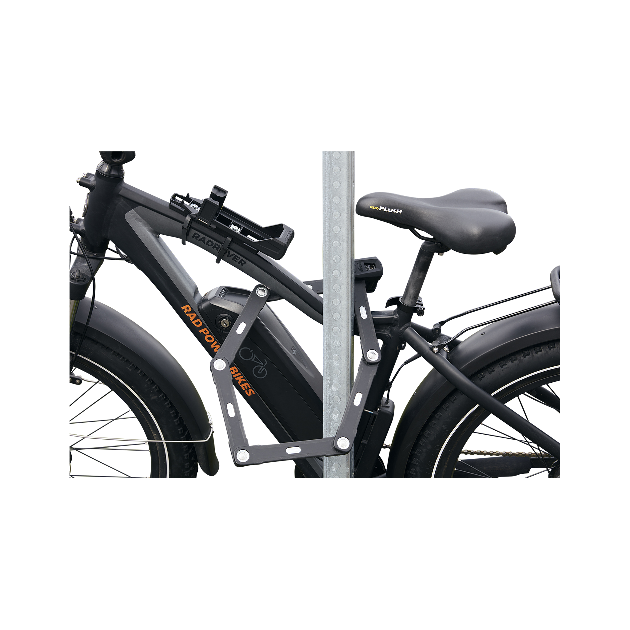 Close up side view of ABUS Bordo Granit X-Plus 6500 Folding Lock safely locking an ebike through the frame to a bike rack.