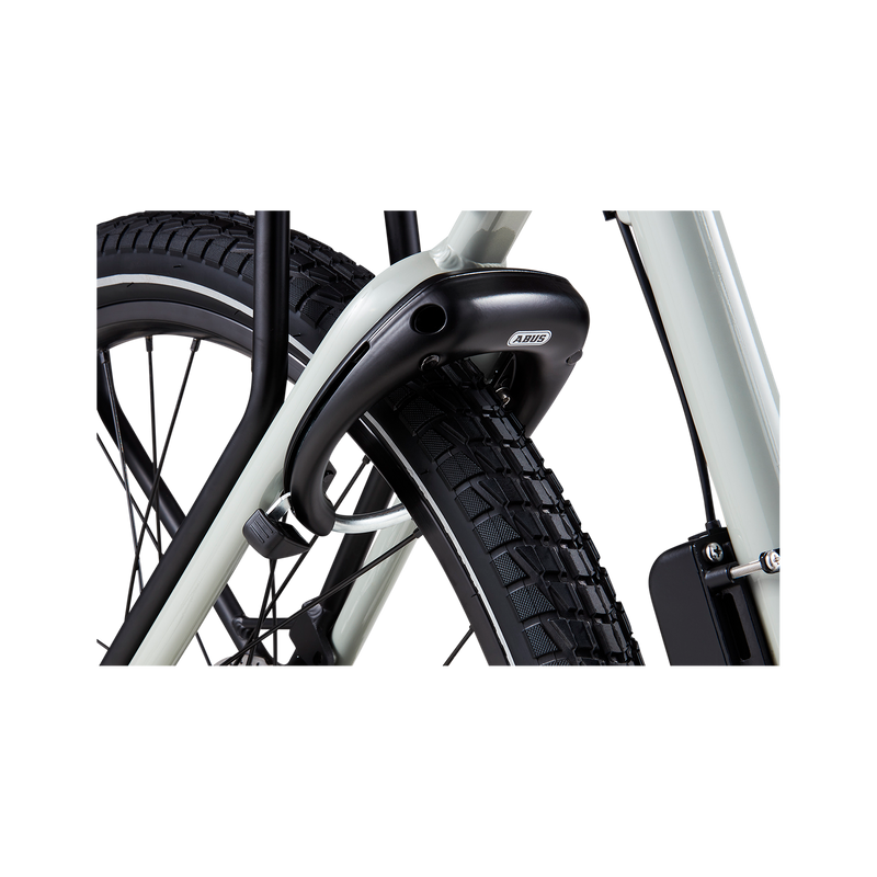 Close up of black, locked ABUS Wheel Lock 5650L NR on the rear wheel of a gray ebike.