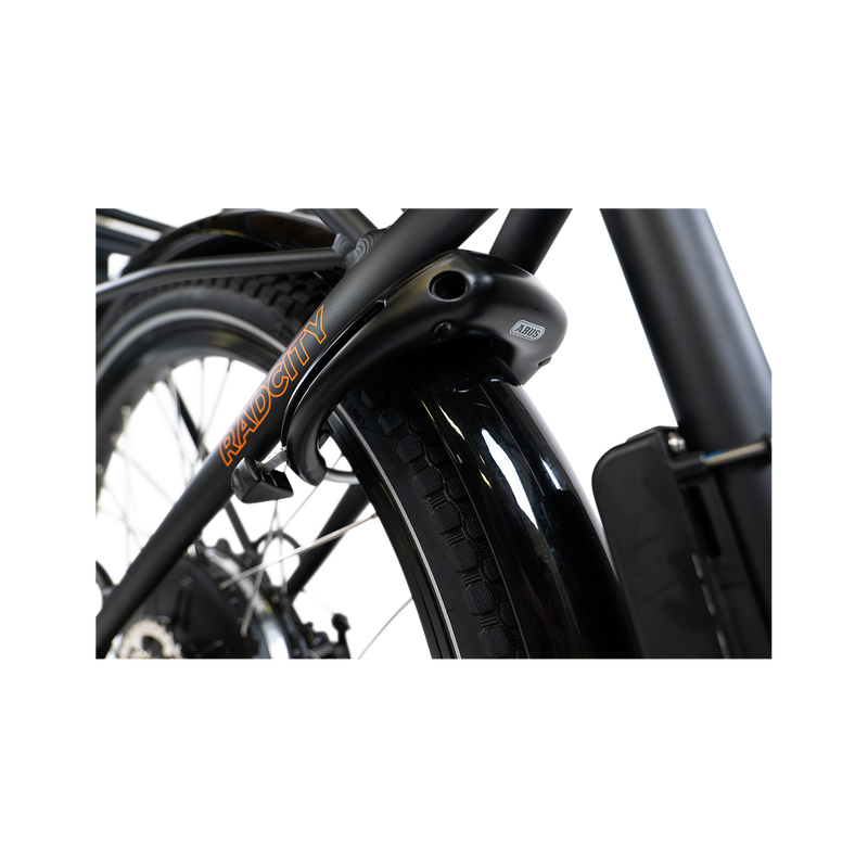 Close up of black, locked ABUS Wheel Lock 5650L NR on the rear wheel of a charcoal RadCity ebike with black fenders.
