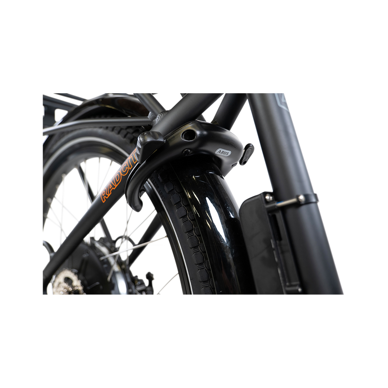Close up of black, unlocked ABUS Wheel Lock 5650L NR on the rear wheel of a charcoal RadCity ebike with black fenders.