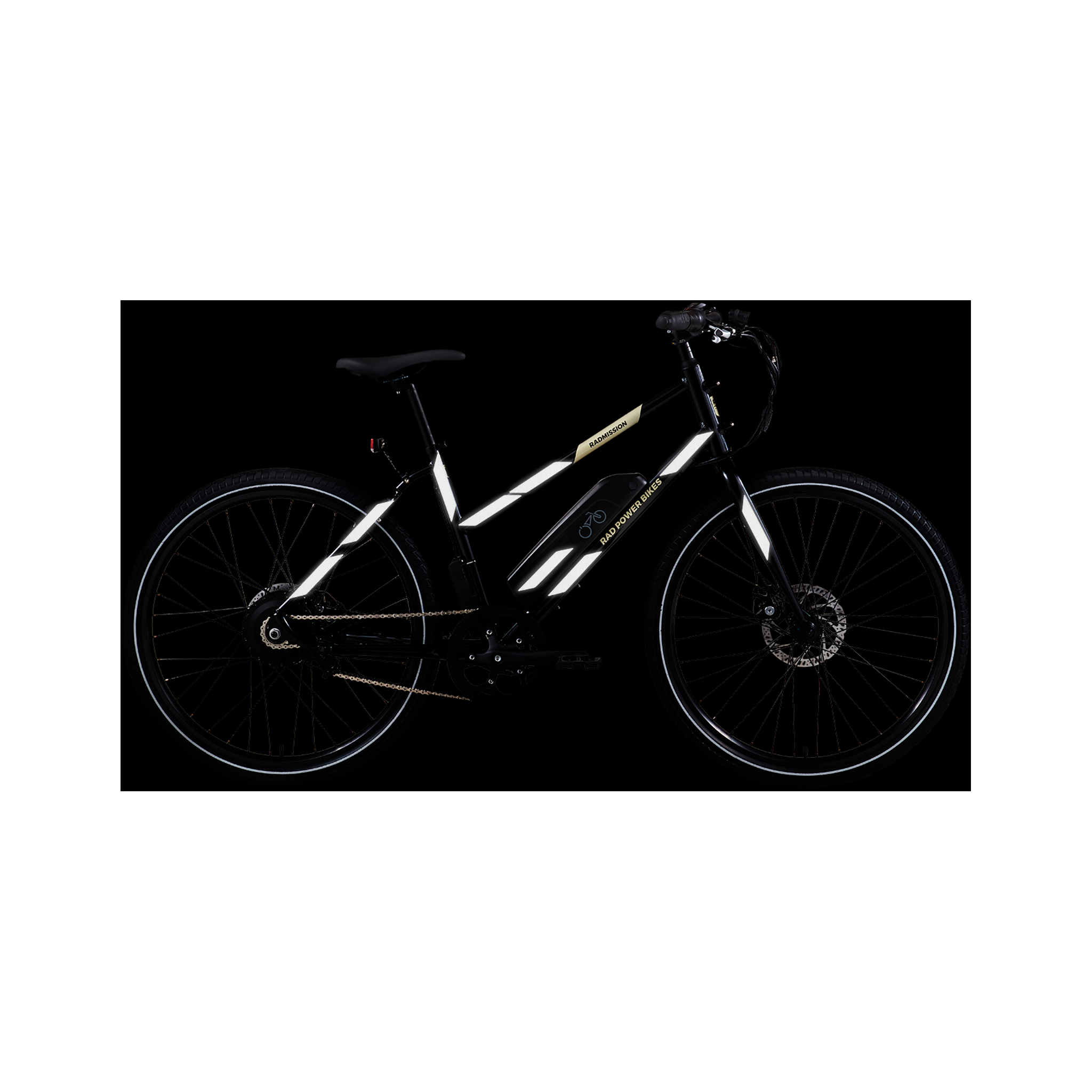 Side view of a RadMission showing how installed Reflective Safety Stickers look in low light on a black background