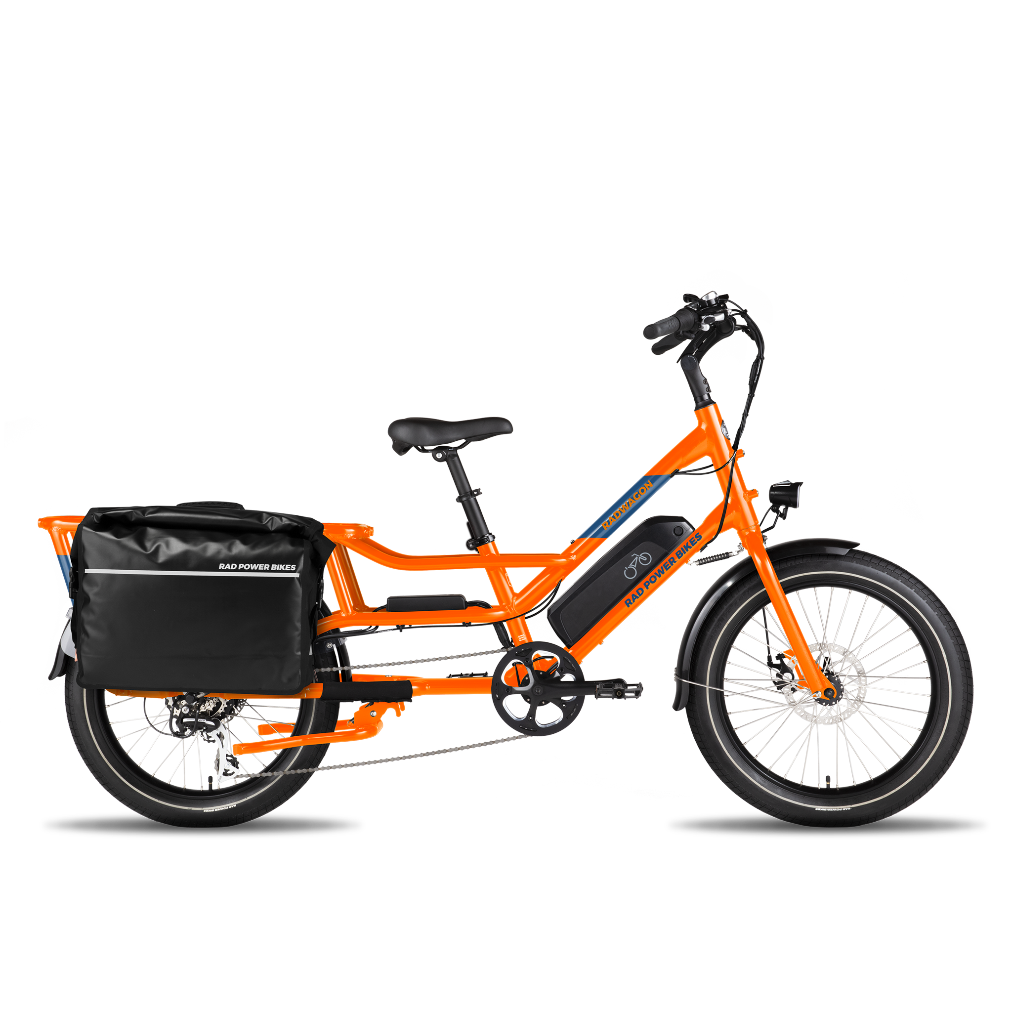 Full side view of an orange RadWagon with a fully-loaded black Ballard Cargo Bag on the rear rack.