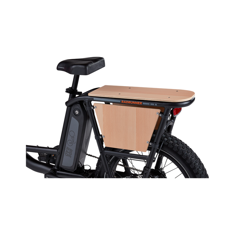 Close up of RadRunner Wood Panels on a RadRunner rear rack. The wood panels are lighter in color and are on the top and both sides of the rear rack evoking a vintage surf aesthetic for the ebike.