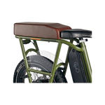 Close up side section of green RadRunner ebike with espresso passenger seat on rear rack with clear plastic skirt cover and retractable foot pegs.