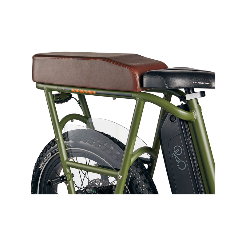 Close up side section of green RadRunner ebike with espresso passenger seat on rear rack with clear plastic skirt cover and retractable foot pegs.