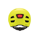 A person turns on the safety light on the back of a cloudgrey Smith Express MIPS helmet